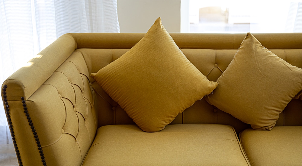 Restoration of upholstered furniture may involve repairing armrests and cushions or replacing upholstery and fabrics