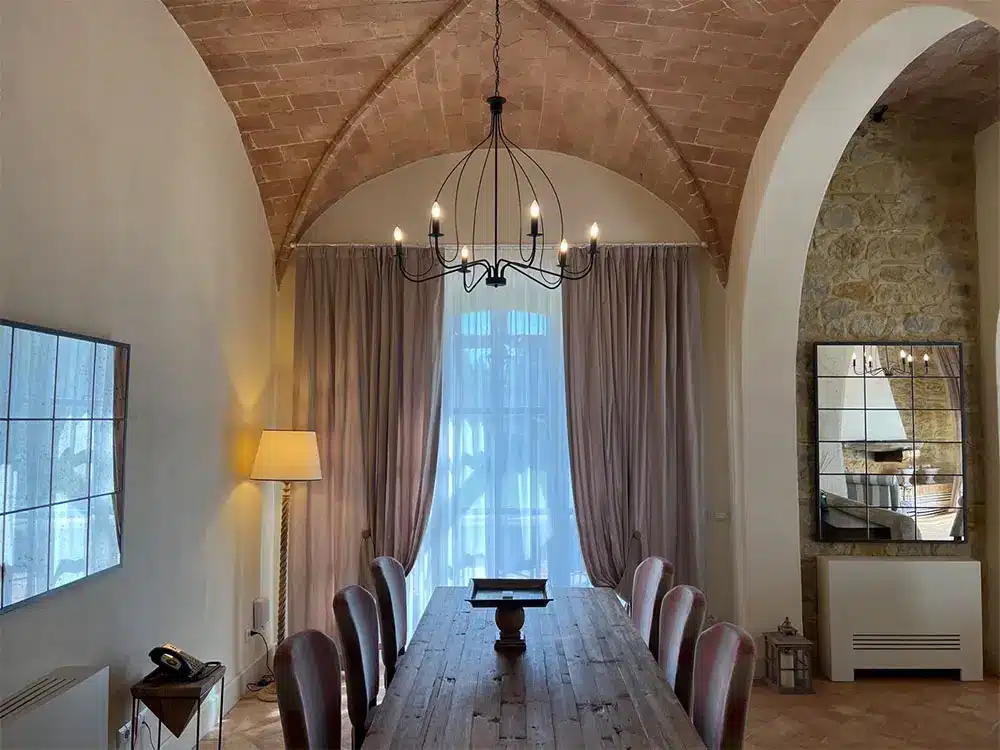 Progettazione di interni per soggiorno e cucina di un agriturismo in Toscana