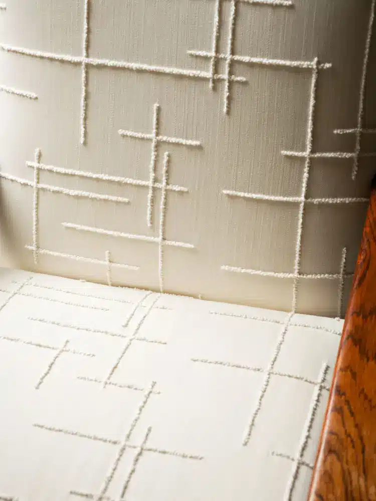 Bouclé fabric from Dedar's Magnolia collection to upholster an armchair